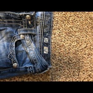Size 28 Miss Me bootcut jeans.